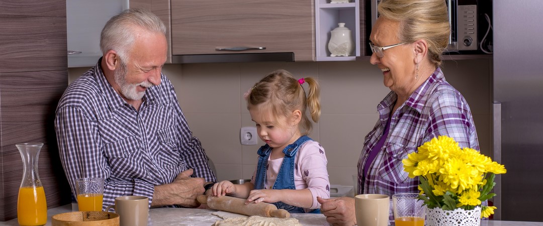 adorable-little-girl-cooking-with-her-grandparents.jpg